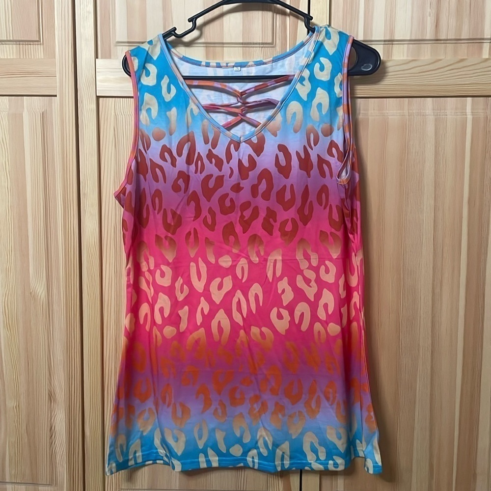 T2.   Boutique tank.